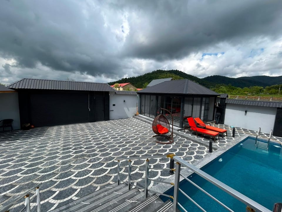 Swimming pool, sunbed