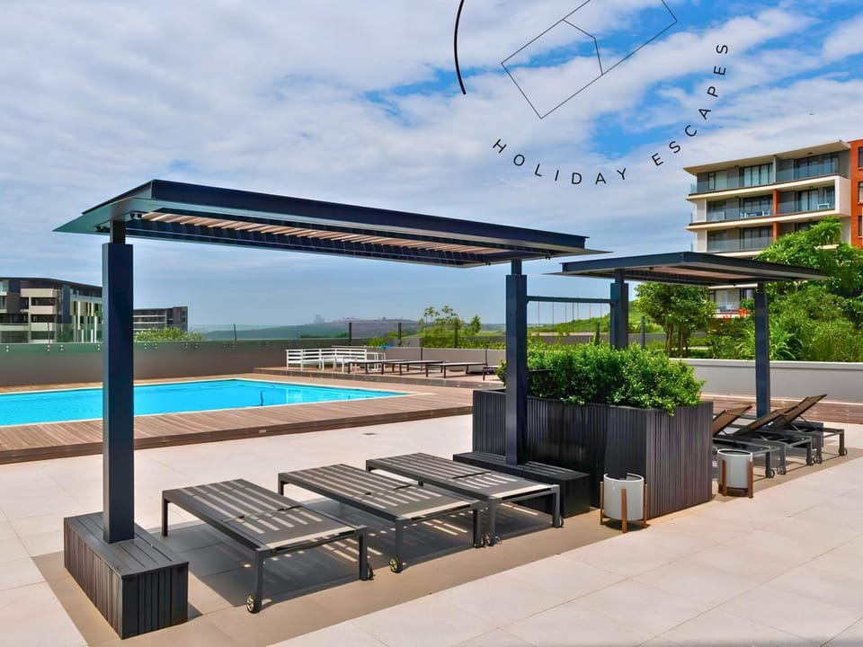 Property building, Seating area, Sea view, Swimming pool, sunbed