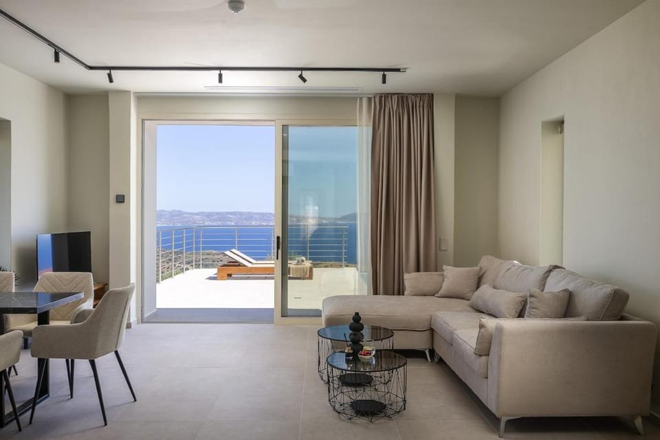 TV and multimedia, Living room, Seating area, Pool view, Sea view