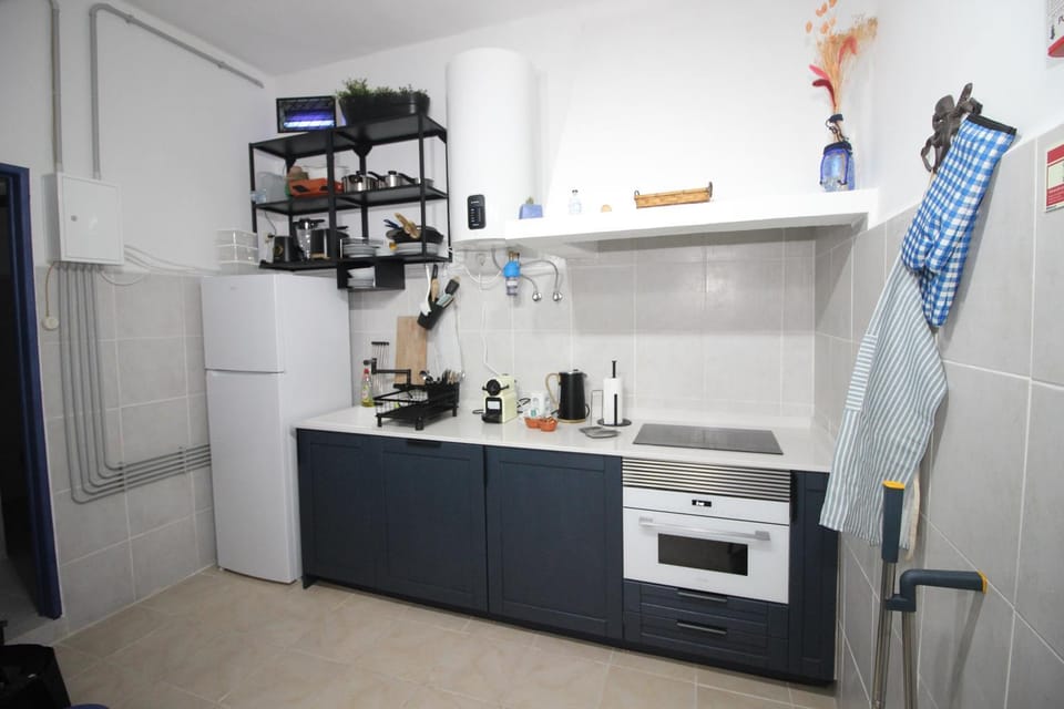Kitchen or kitchenette, oven