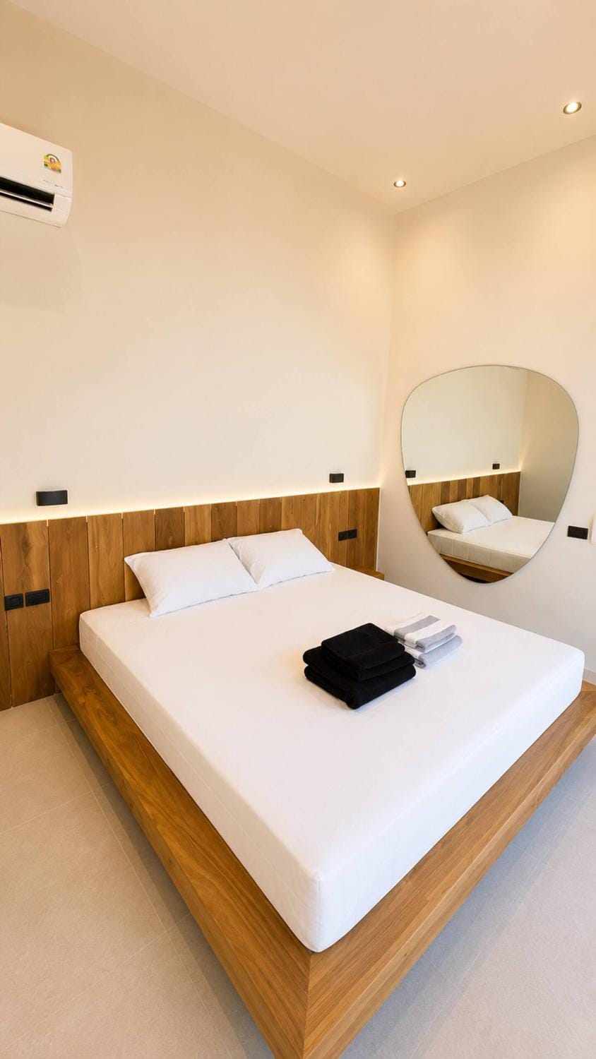 Bed, Photo of the whole room, Bedroom, towels, air conditioner
