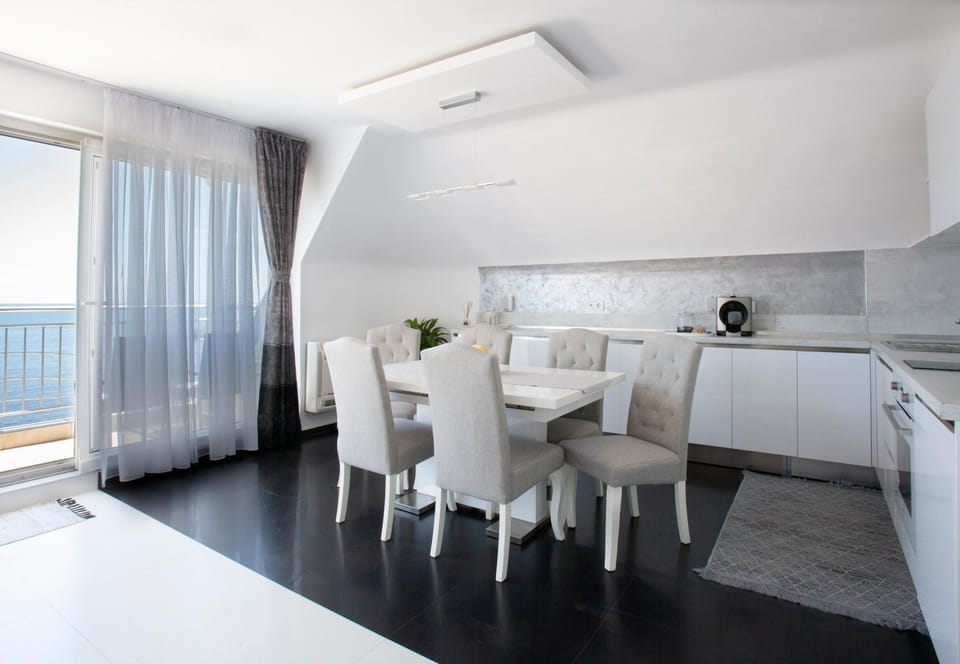 Kitchen or kitchenette, Living room, Dining area, Sea view