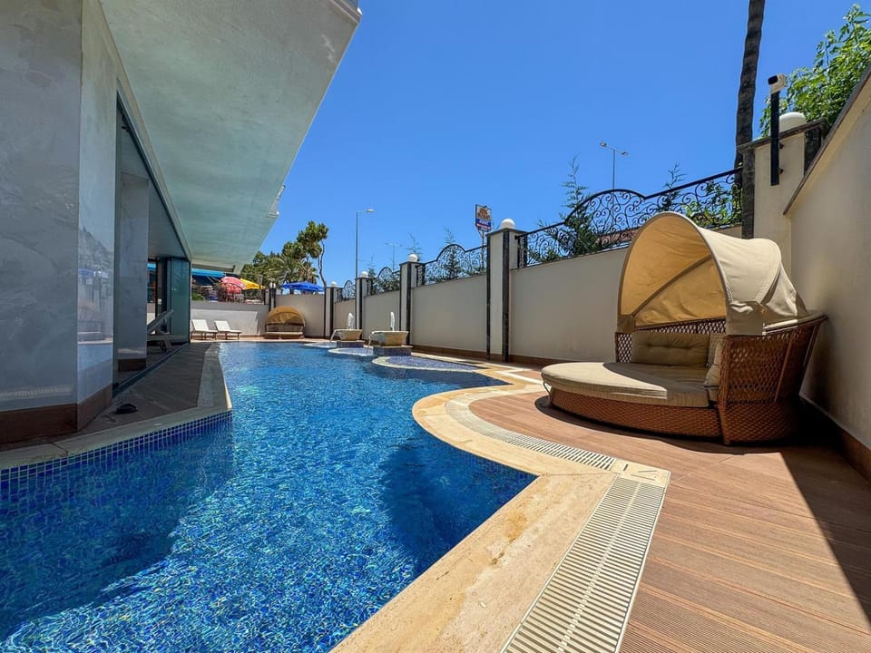 Swimming pool, sunbed