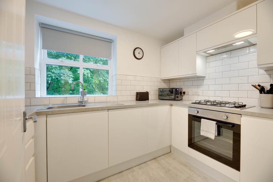 Kitchen or kitchenette, stove, toaster