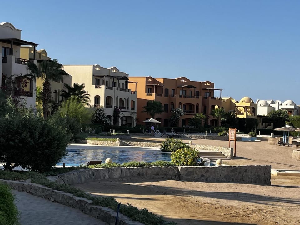 Property building, Neighbourhood, Natural landscape, City view, Pool view, Swimming pool, Location