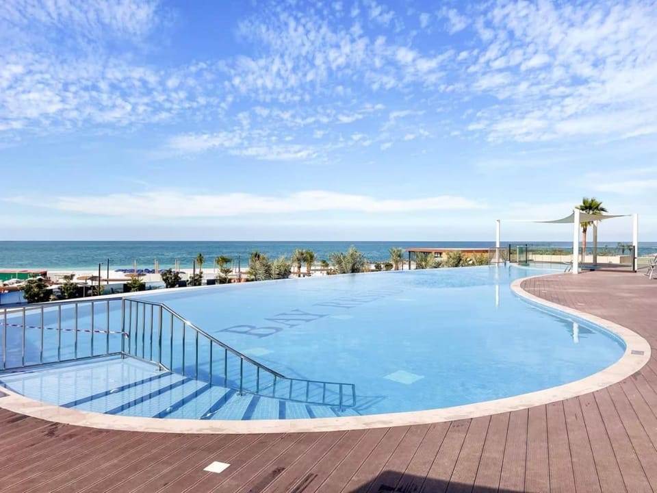 FIRST CLASS 1BR Beachfront Bliss Oasis Apartment in Ras al Khaimah