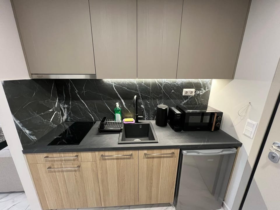 Kitchen or kitchenette, microwave