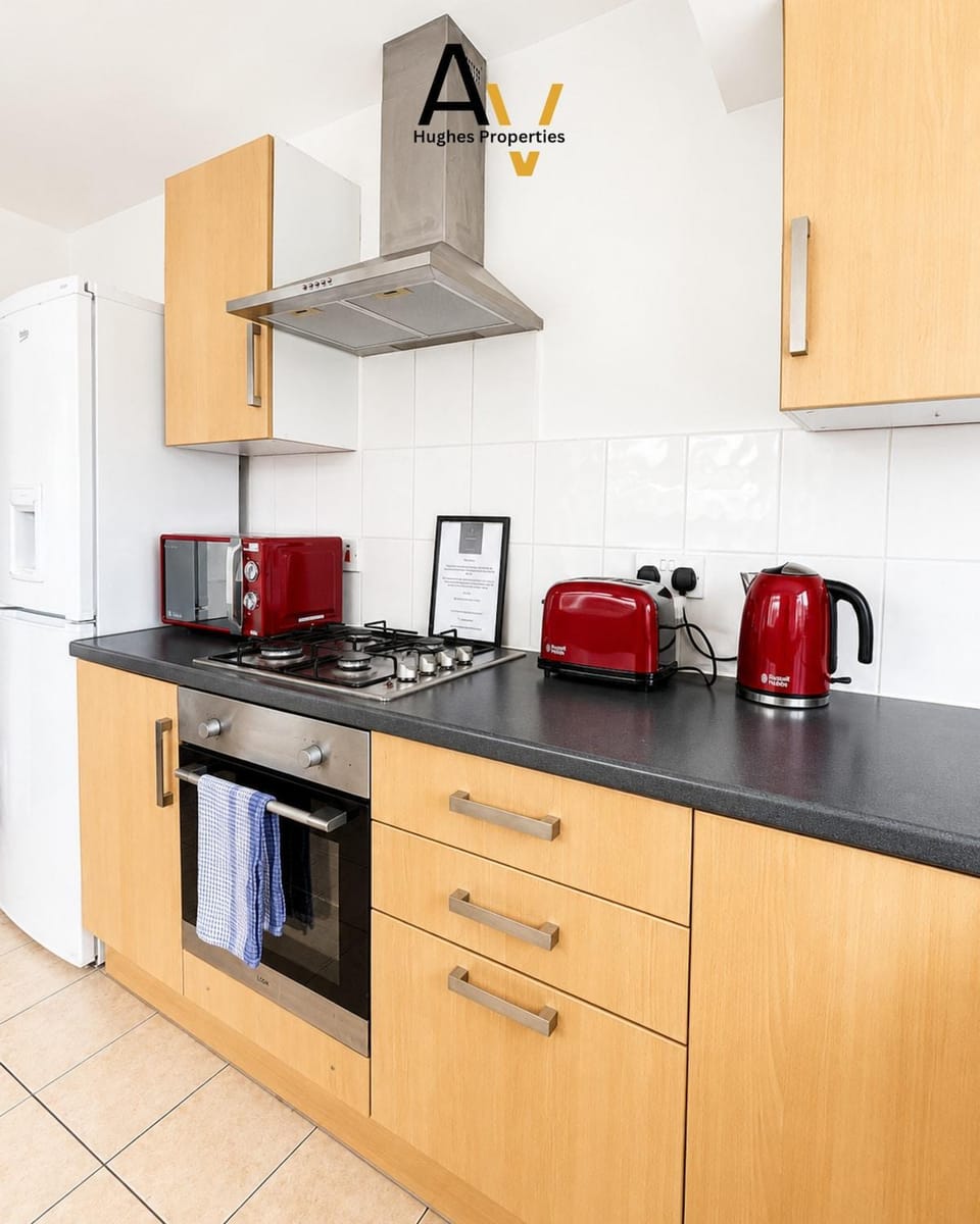 Kitchen or kitchenette, stove, toaster