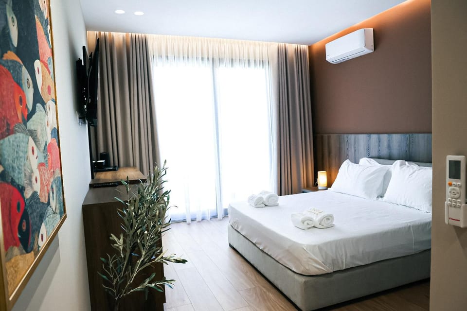 Photo of the whole room, Bedroom, towels, air conditioner