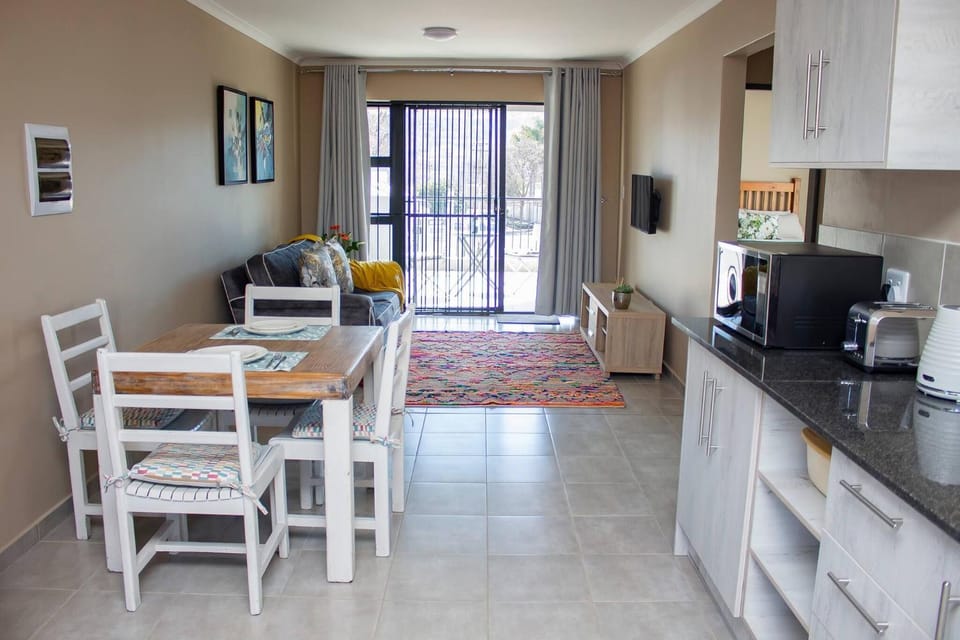Dining area, microwave, oven, kitchen