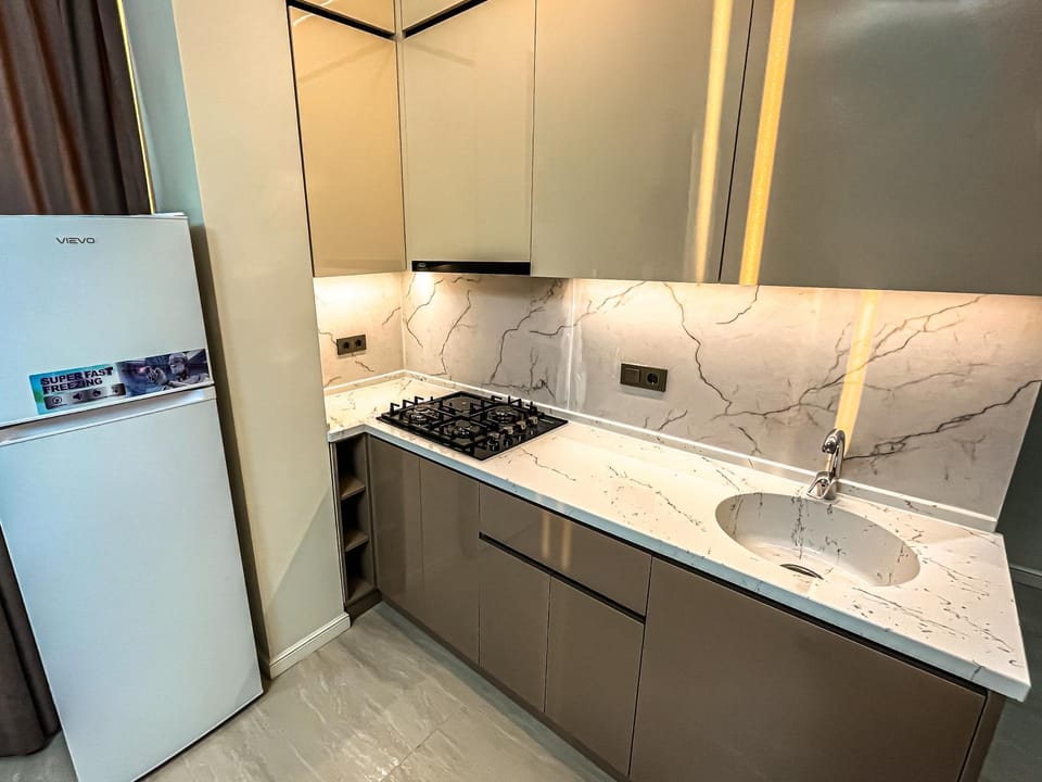 Kitchen or kitchenette, stove