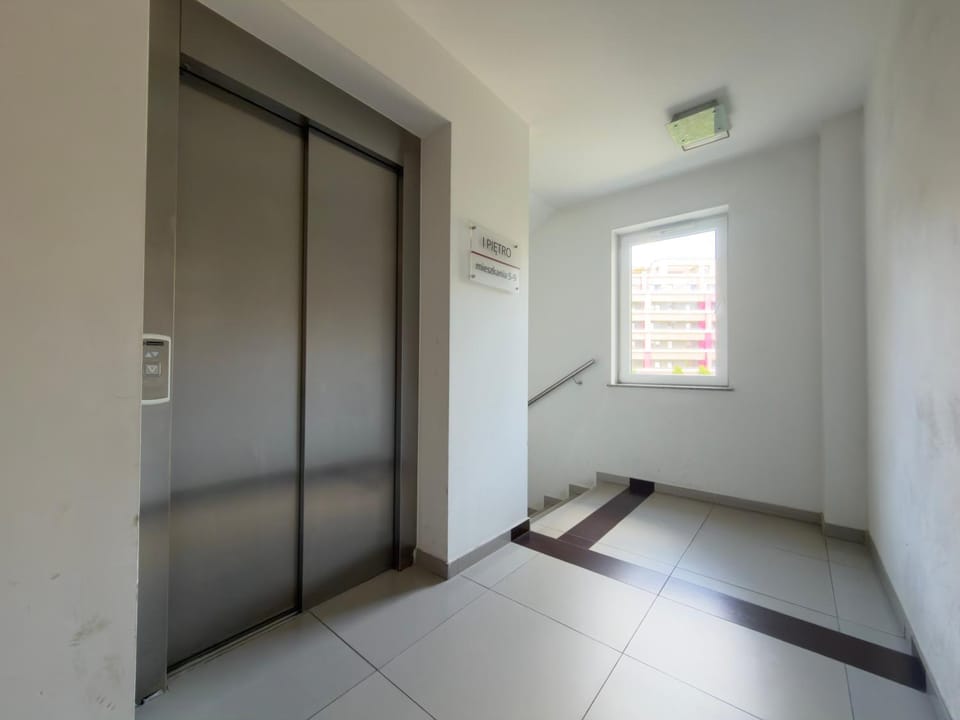 Property building, elevator