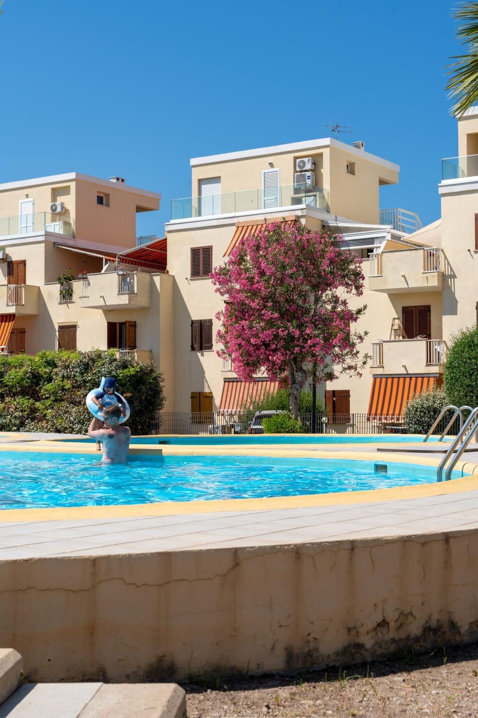 Property building, Day, Pool view, Swimming pool