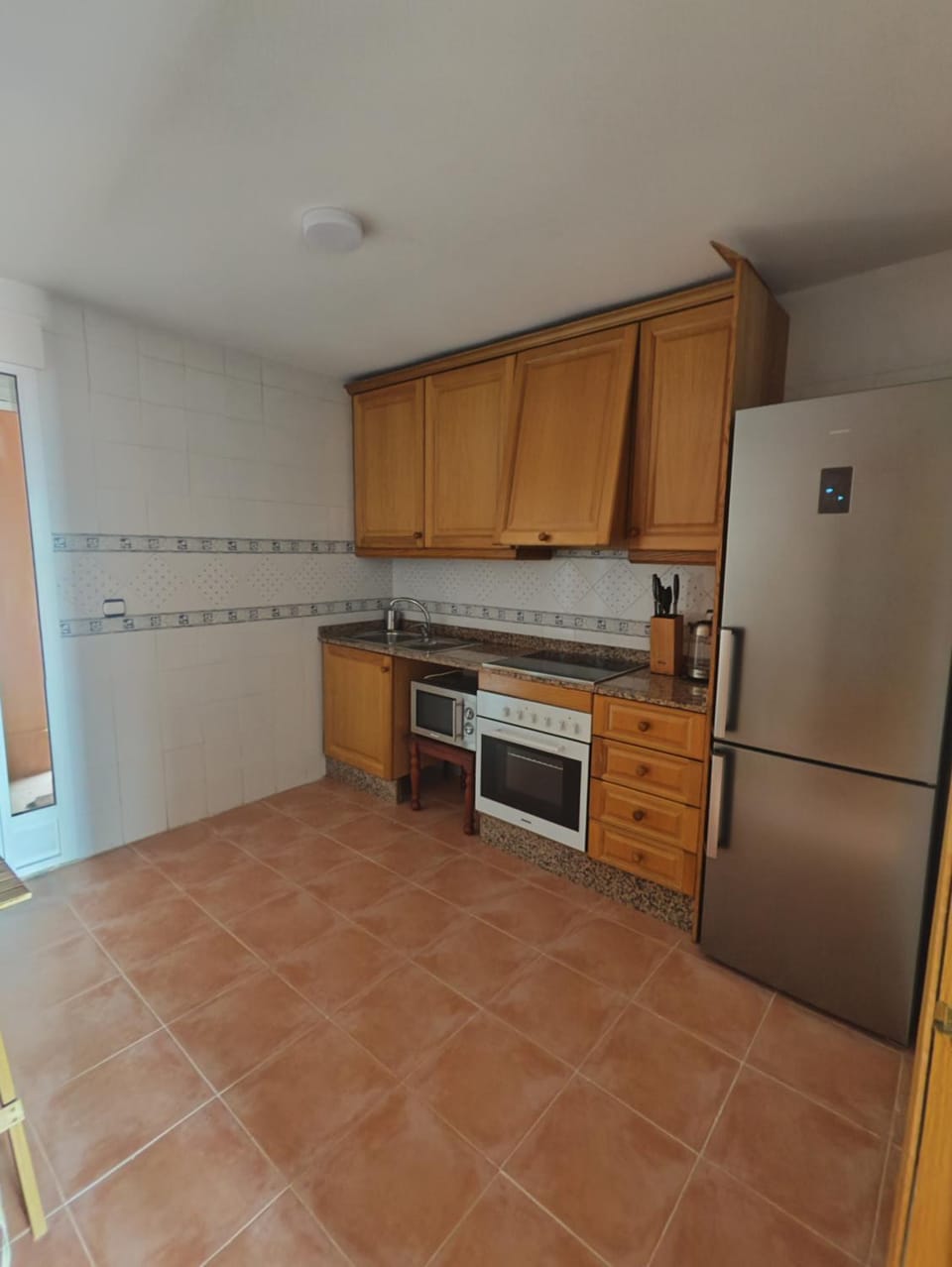 Kitchen or kitchenette, oven