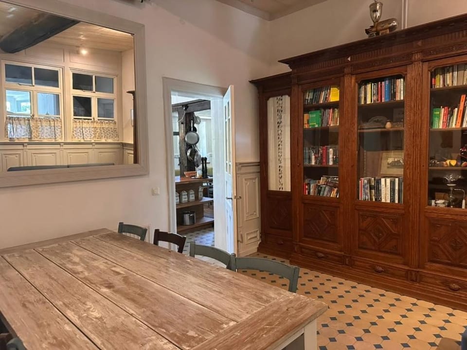 Library, Living room, Seating area, Dining area