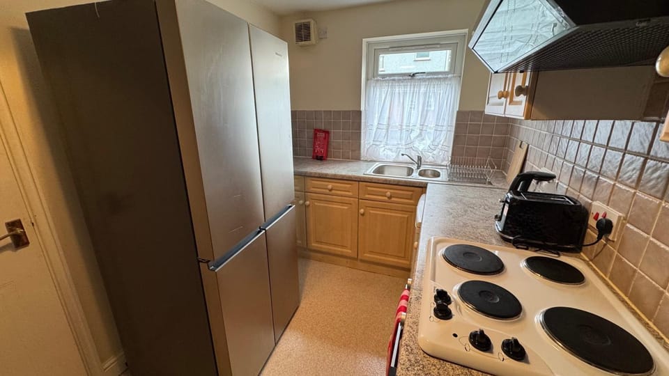 Kitchen or kitchenette, dishwasher, toaster