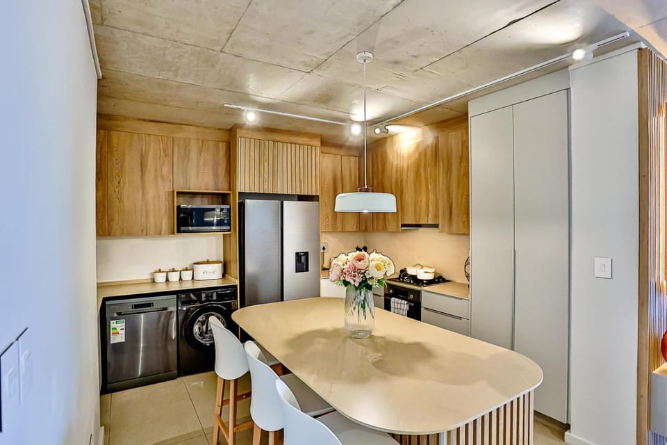 Kitchen or kitchenette, dishwasher, oven, stove