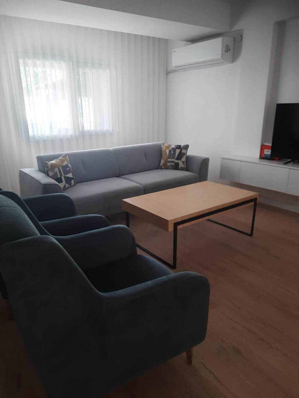 Communal lounge/ TV room, TV and multimedia, Living room, Seating area, Evening entertainment, air conditioner