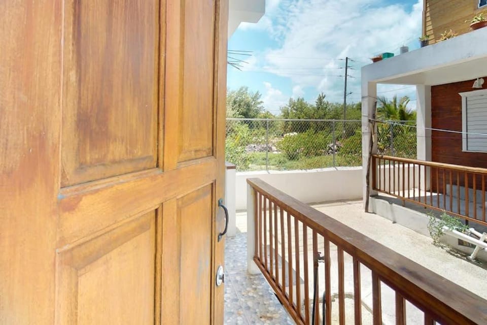 Enchanting single-level living space with a mini kitchen in a prime area Apartment in Belize District