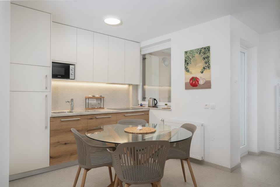 Dining area, microwave, stove, kitchen
