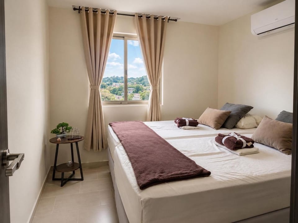 Bed, Photo of the whole room, Bedroom, towels, air conditioner