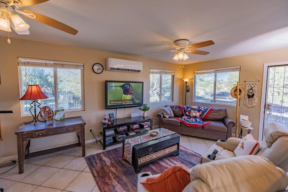 Day, TV and multimedia, Living room, Seating area, furniture, air conditioner