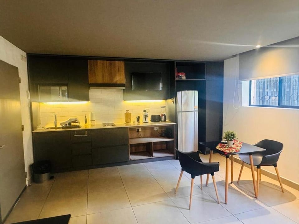 Coffee/tea facilities, Kitchen or kitchenette, Living room, Seating area, Dining area, dishwasher, minibar, oven, stove, toaster
