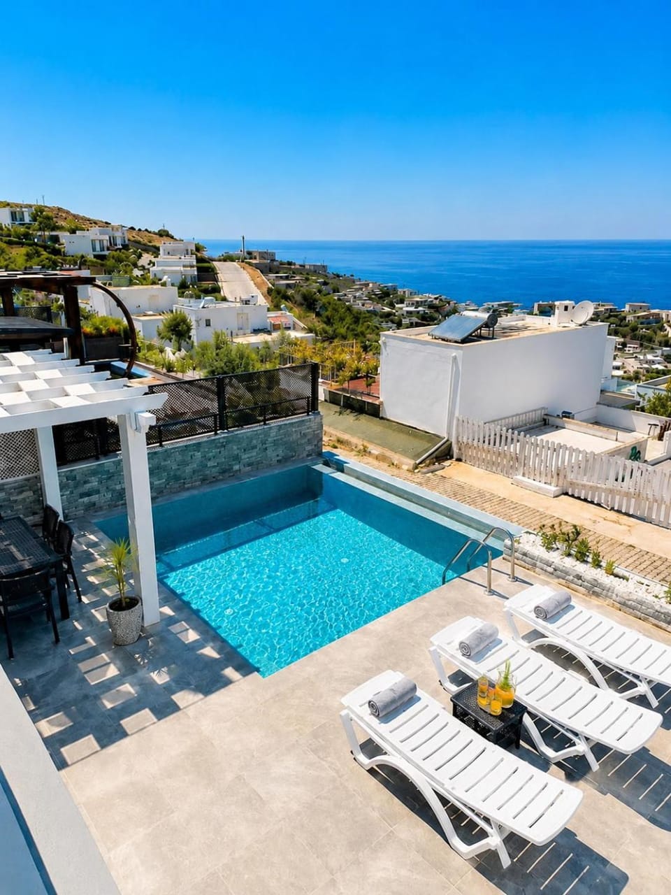 Property building, Patio, Day, Natural landscape, View (from property/room), Balcony/Terrace, Pool view, Sea view, Swimming pool, sunbed