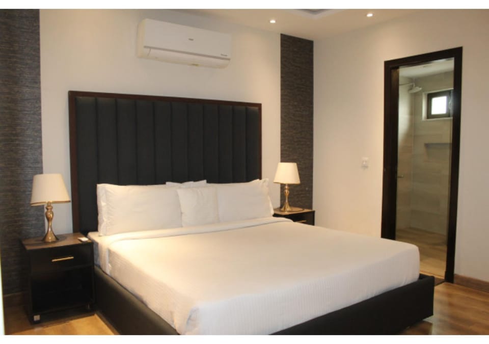 The Charcoal Suite Stylish 2BR at Opus Apartment in Lahore
