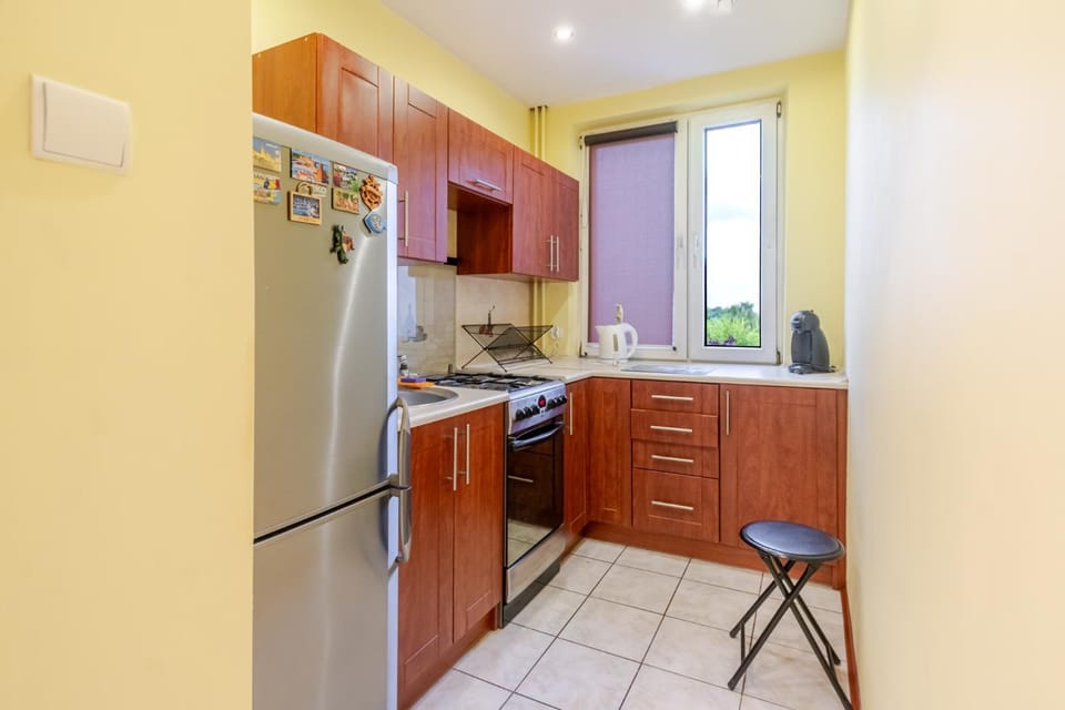Kitchen or kitchenette, dishwasher, oven, stove