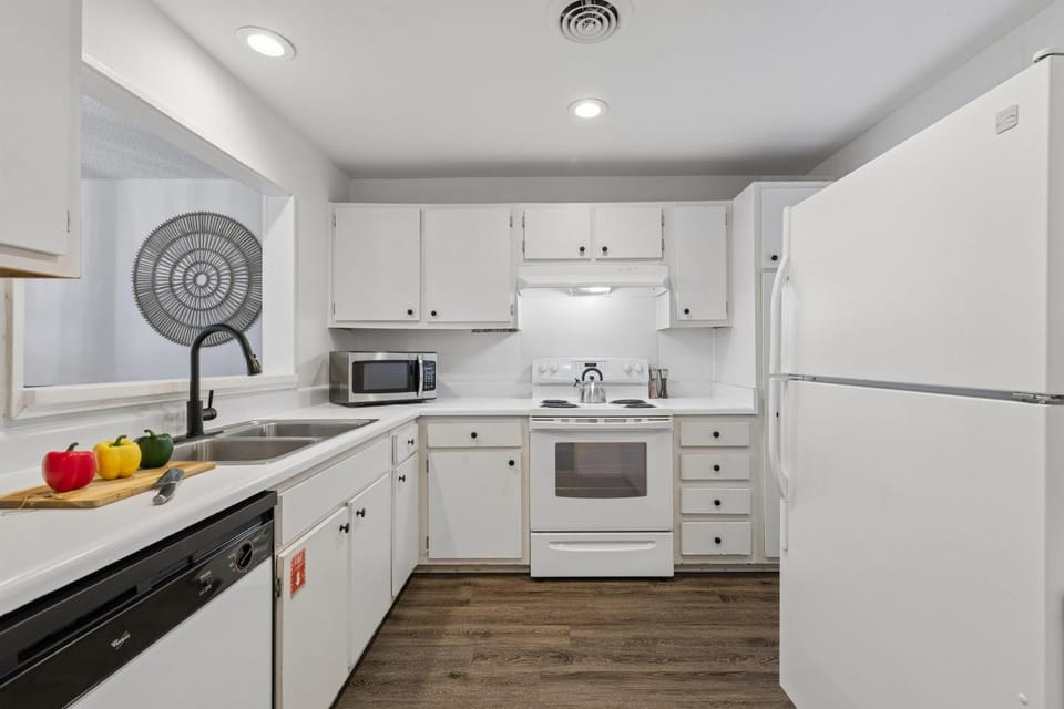 Kitchen or kitchenette, dishwasher, oven, stove, toaster