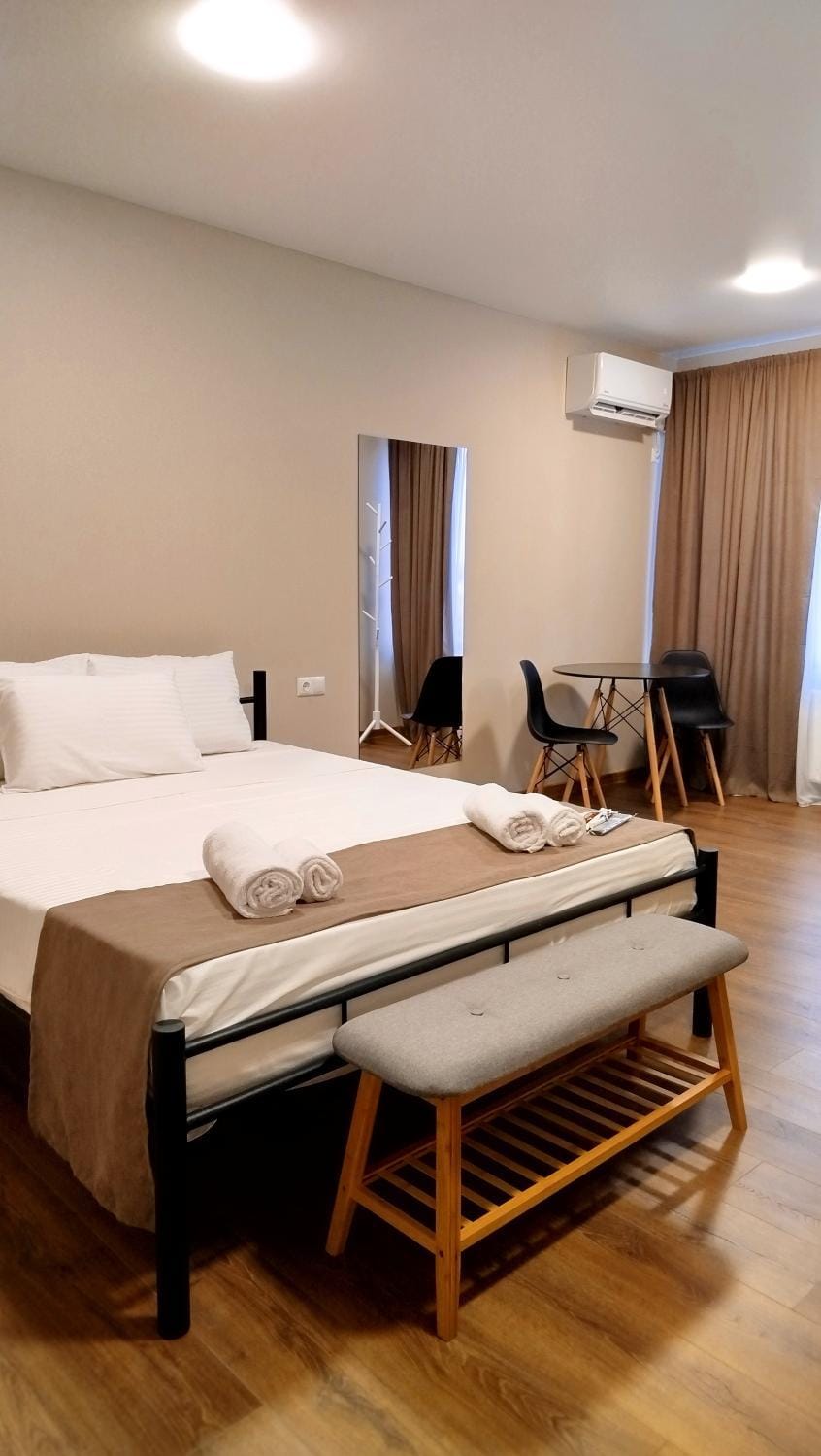 Bed, Seating area, Bedroom, towels, air conditioner