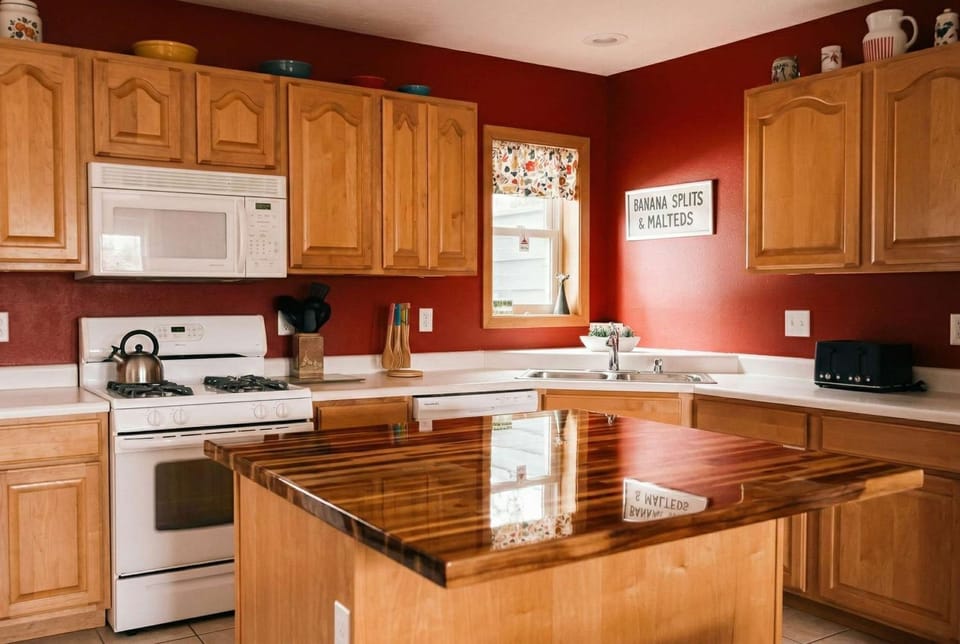 Kitchen or kitchenette, dishwasher, oven, stove, toaster