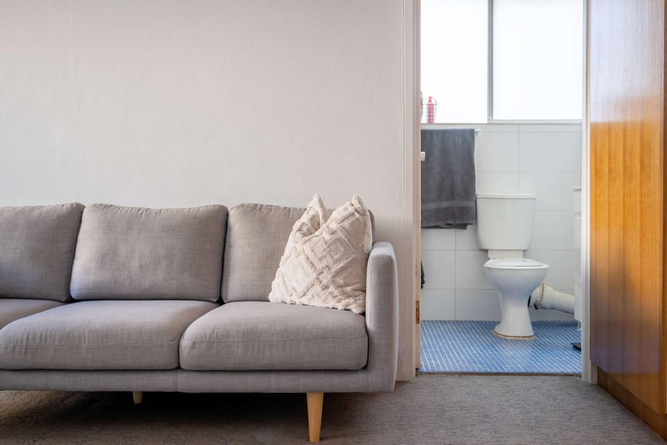 Toilet, Bathroom, Living room, Seating area