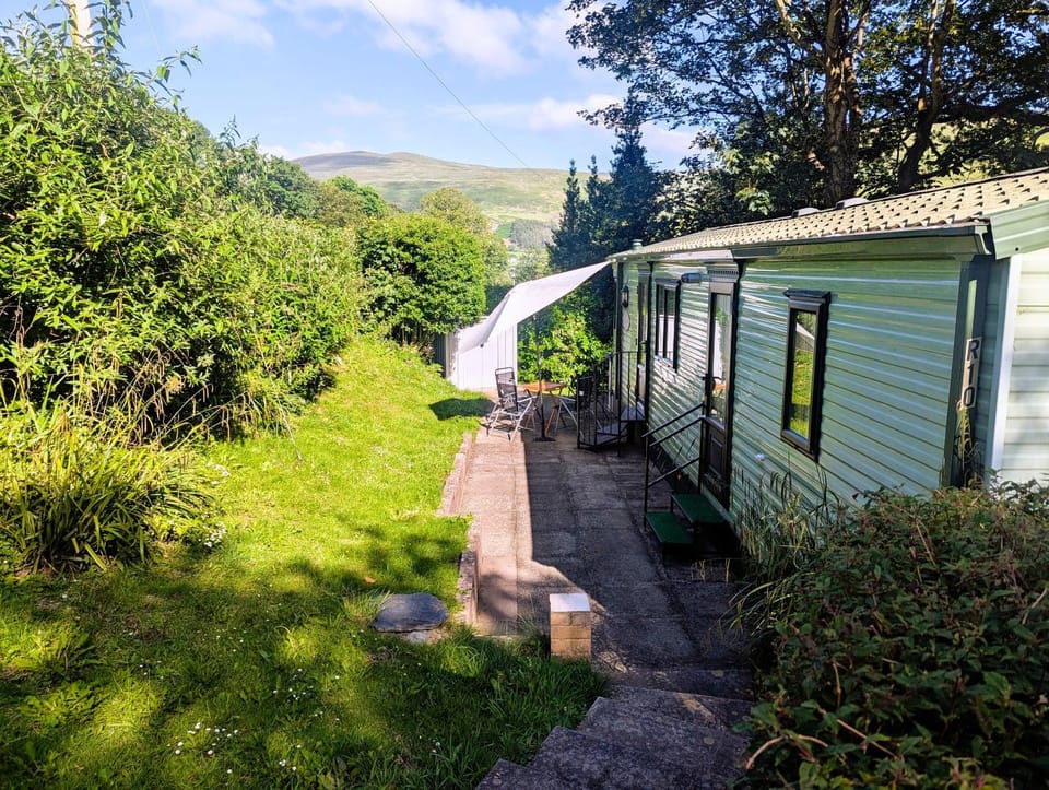 Property building, Patio, View (from property/room), Seating area, Garden view, Mountain view