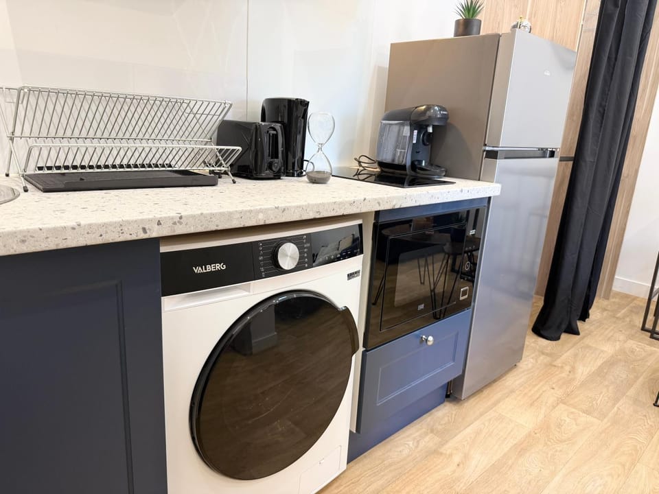 Kitchen or kitchenette, oven, stove, toaster