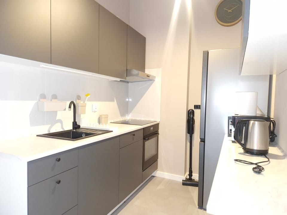 Kitchen or kitchenette, microwave, oven, stove, kitchen