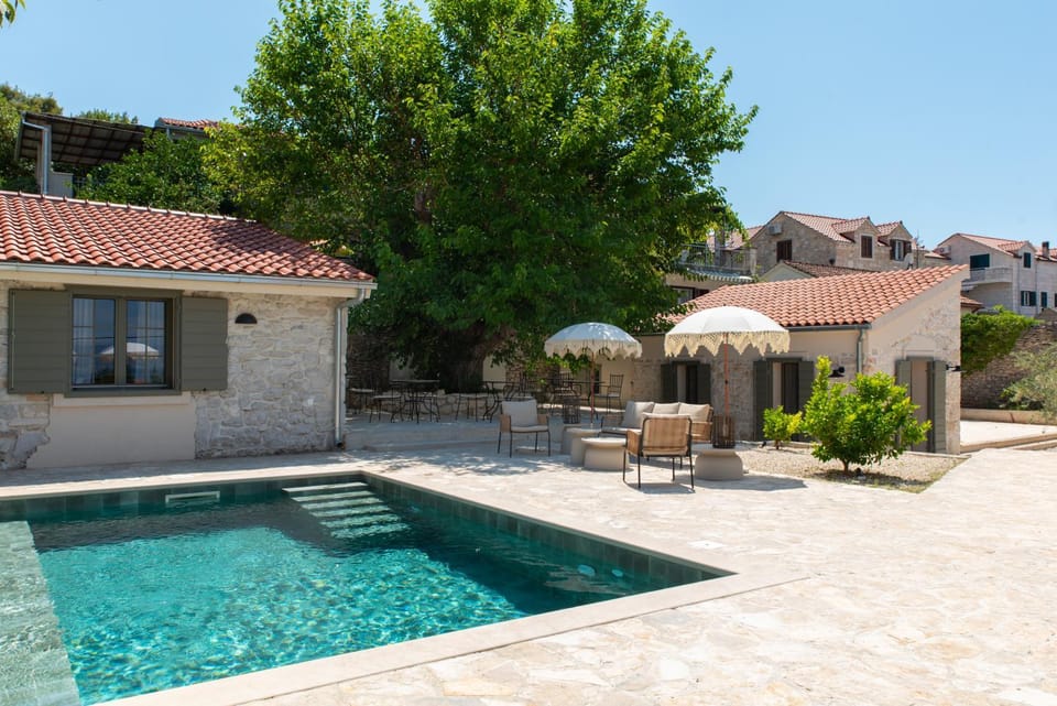 Property building, Patio, Day, Pool view, Swimming pool