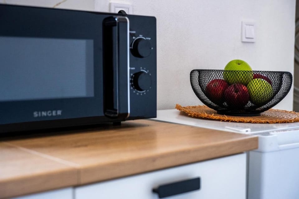 Kitchen or kitchenette, microwave