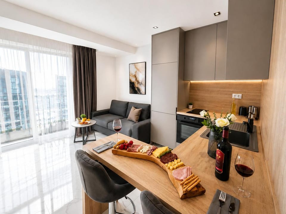 Coffee/tea facilities, Kitchen or kitchenette, Living room, Seating area, Dining area, Drinks
