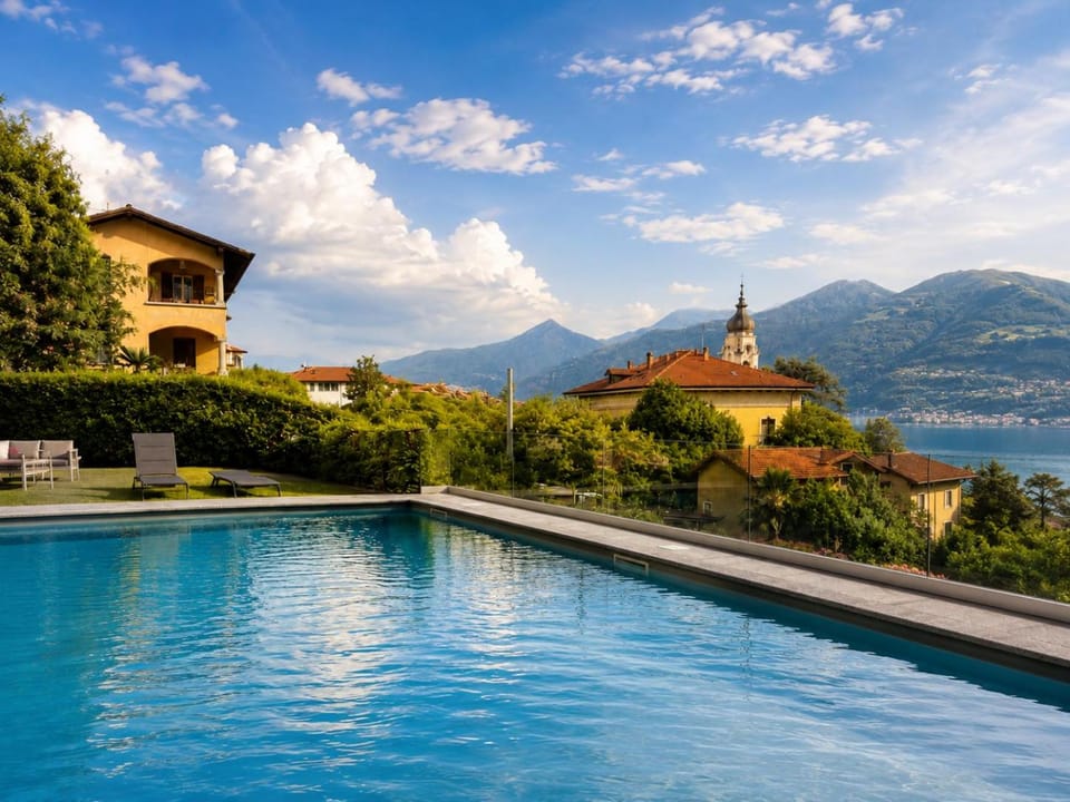 Property building, Nearby landmark, Spring, Day, Natural landscape, Lake view, Mountain view, Pool view, Swimming pool
