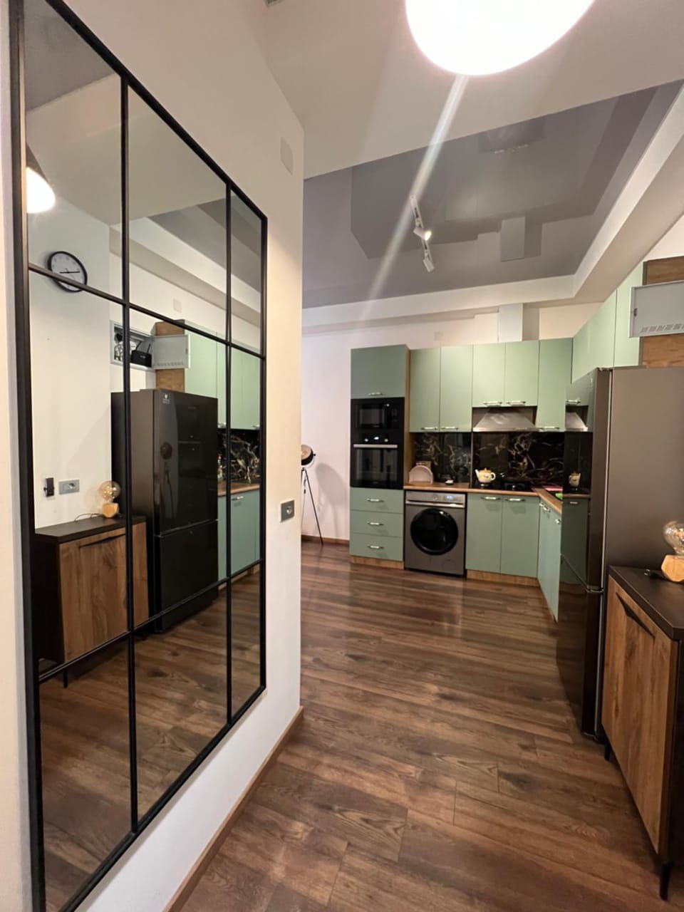 Kitchen or kitchenette, dishwasher, oven, stove