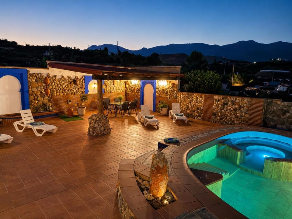 Patio, Night, Natural landscape, Mountain view, Pool view, Swimming pool, sunbed
