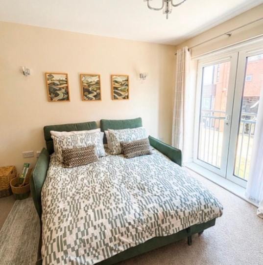 Bed, Living room, Seating area