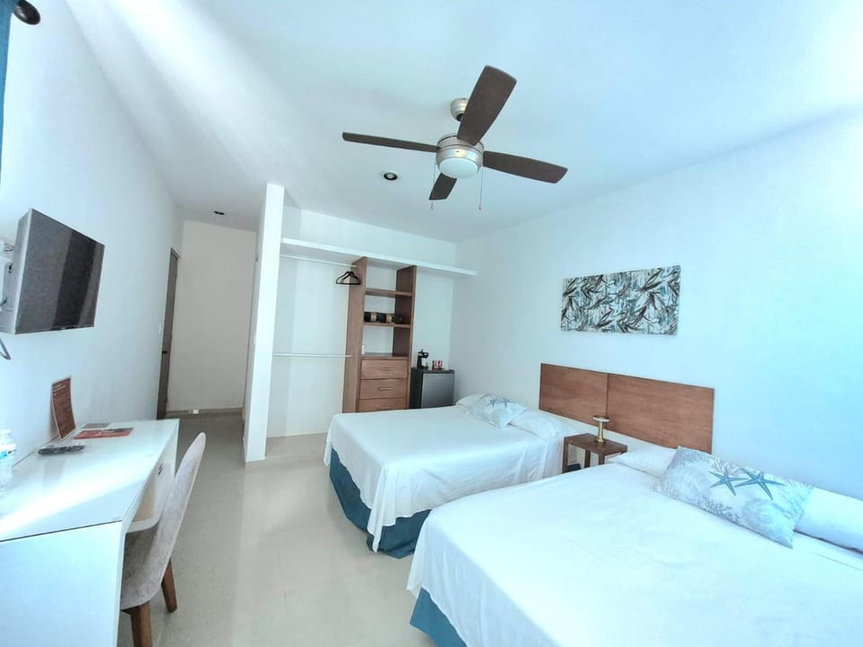 Bed, People, TV and multimedia, Photo of the whole room, Bedroom, children, Family, furniture, internet, towels, air conditioner