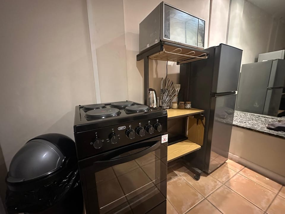 Kitchen or kitchenette, oven, stove, toaster