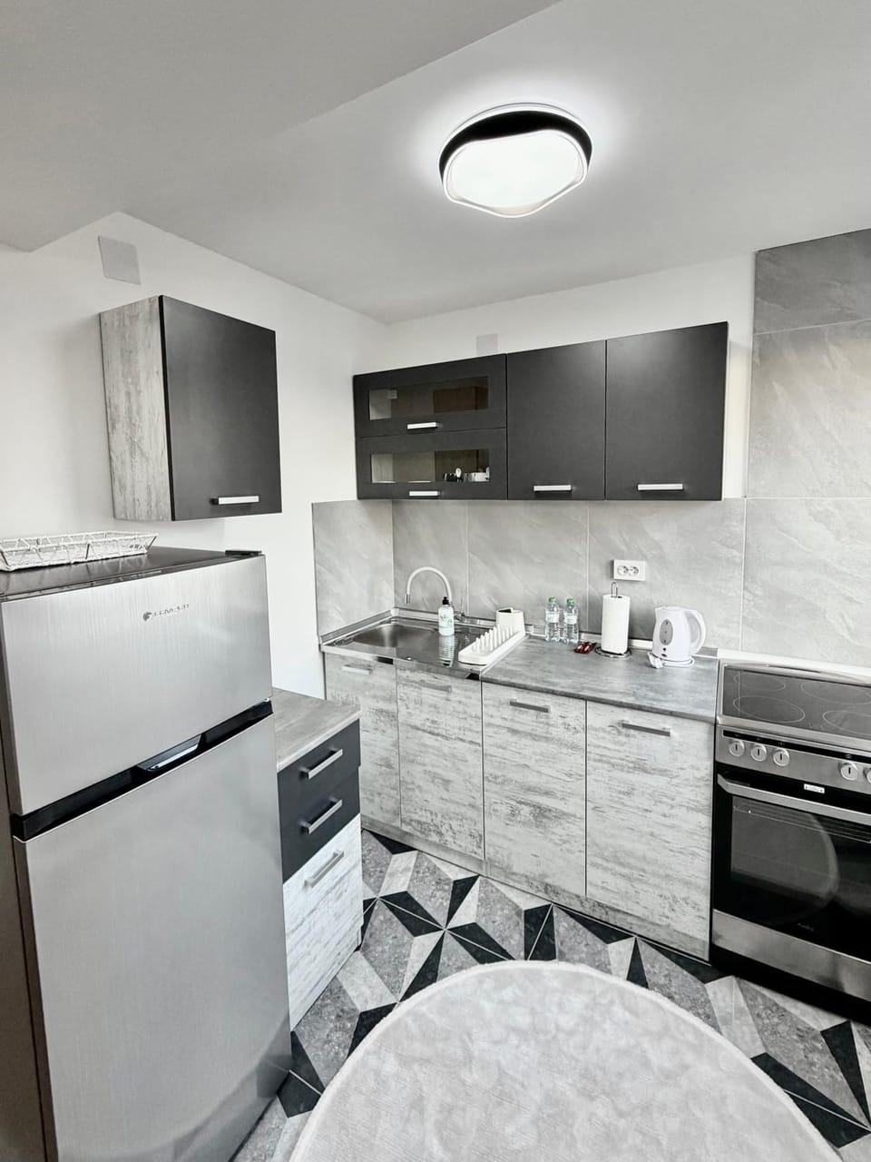 Kitchen or kitchenette, oven