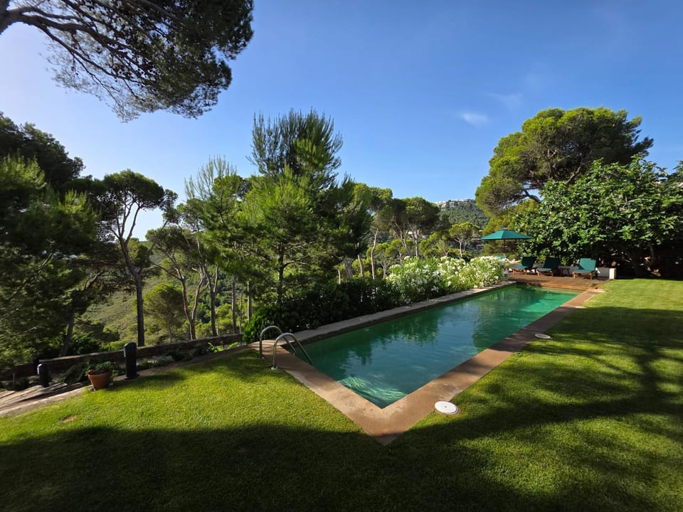 Property building, Living room, Swimming pool