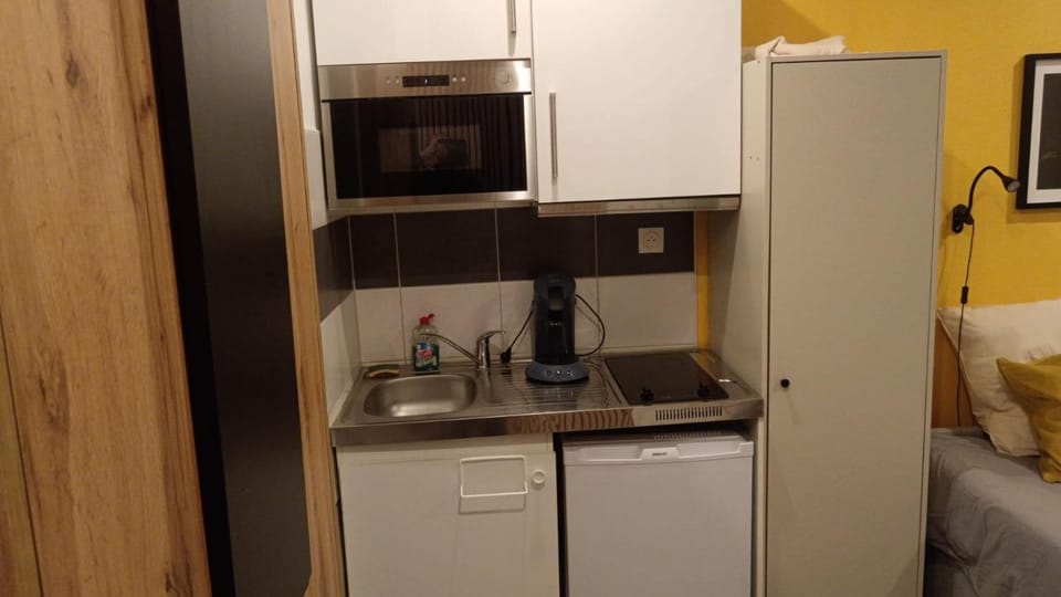 Kitchen or kitchenette, stove