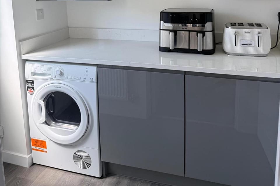 Coffee/tea facilities, Kitchen or kitchenette, toaster, washing machine, dryer